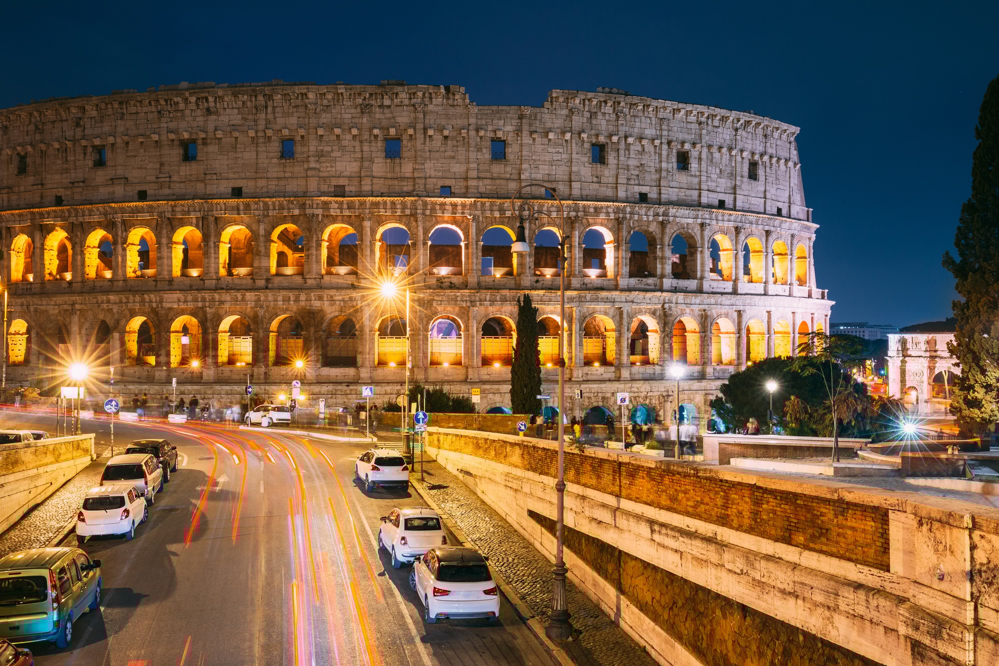 Rome, Italy. Colosseum Also Known As Flavian Amphitheatre In Evening Or Night Time
